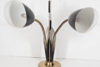 1950s Cat Tail Brass And Enamel Table Lamp Nyshowplace with measurements 1500 X 1264