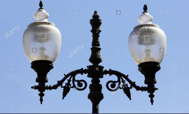 Ornate Wrought Iron Glass Street Light Shade Lampshade Against A intended for size 1300 X 954