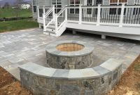 A Beautiful Paver Patio With Stone Seating Walls And A Fire inside sizing 3264 X 2448