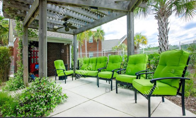 Patio Chairs Are Arranged Beneath A Pergola With Ceiling inside dimensions 1300 X 951