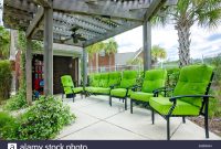 Patio Chairs Are Arranged Beneath A Pergola With Ceiling throughout sizing 1300 X 951