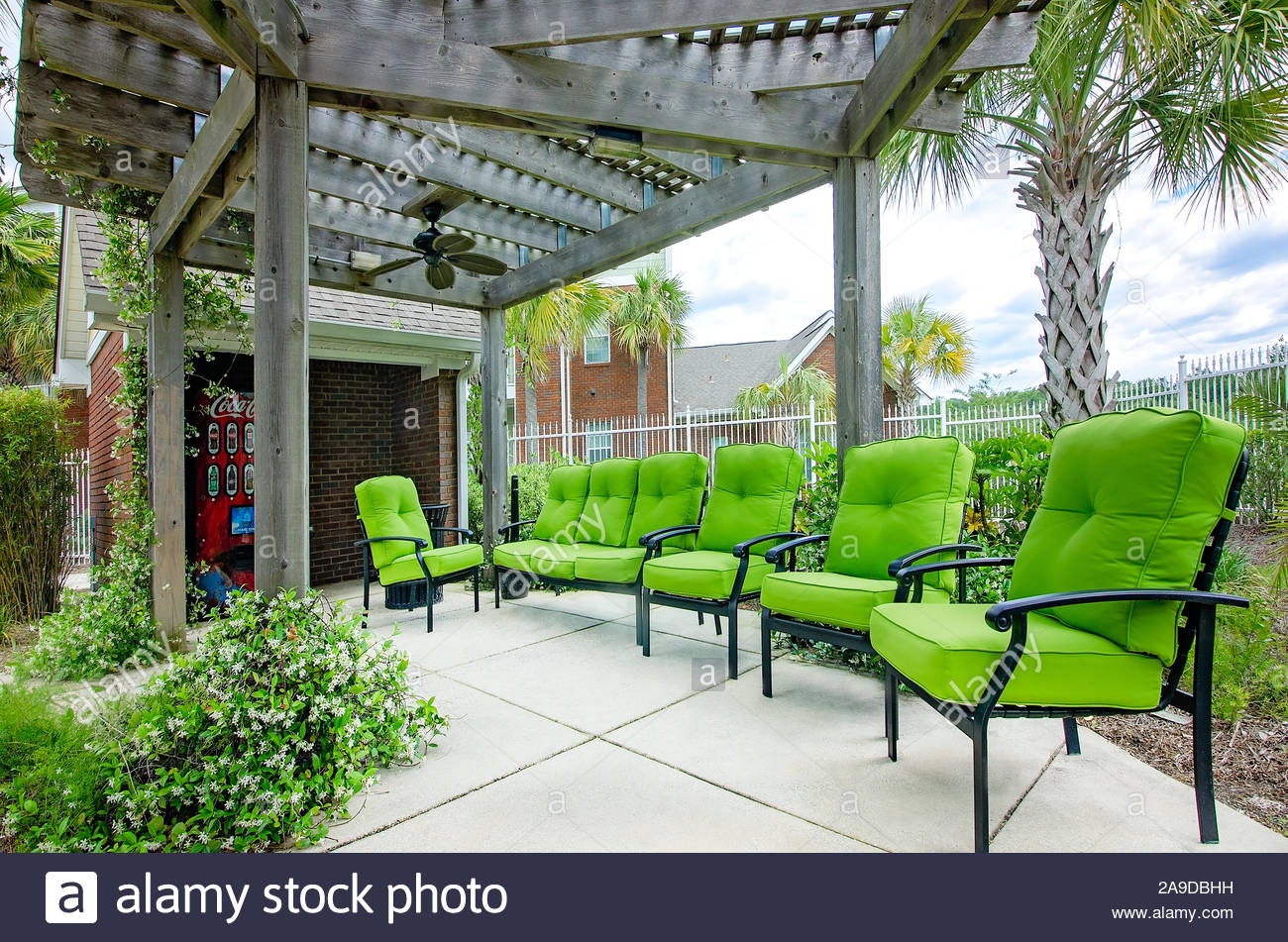 Patio Chairs Are Arranged Beneath A Pergola With Ceiling throughout sizing 1300 X 951