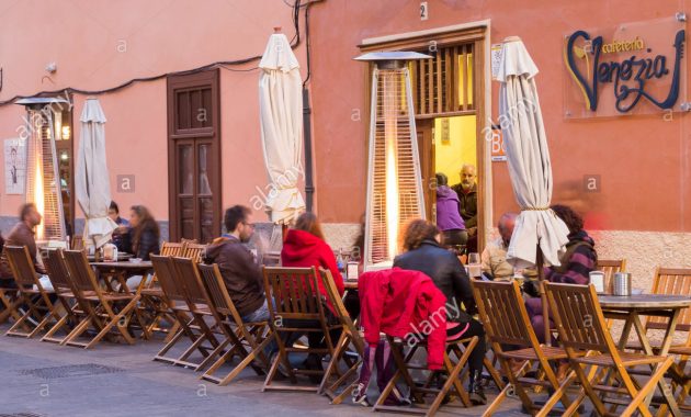 Patio Heaters Outside Street Bar At Night In San Cristobal for measurements 1300 X 982