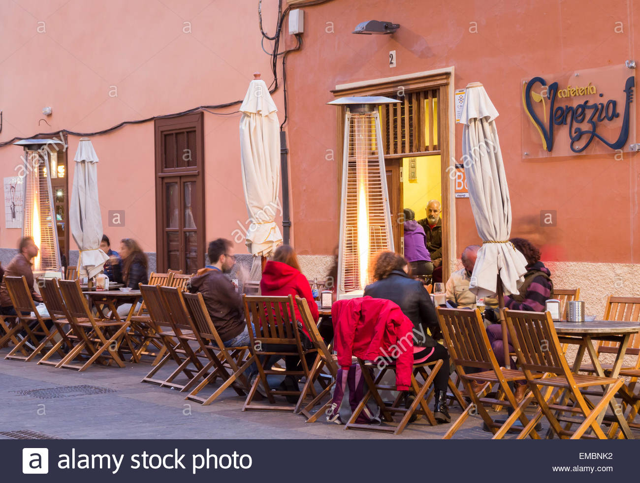 Patio Heaters Outside Street Bar At Night In San Cristobal for measurements 1300 X 982