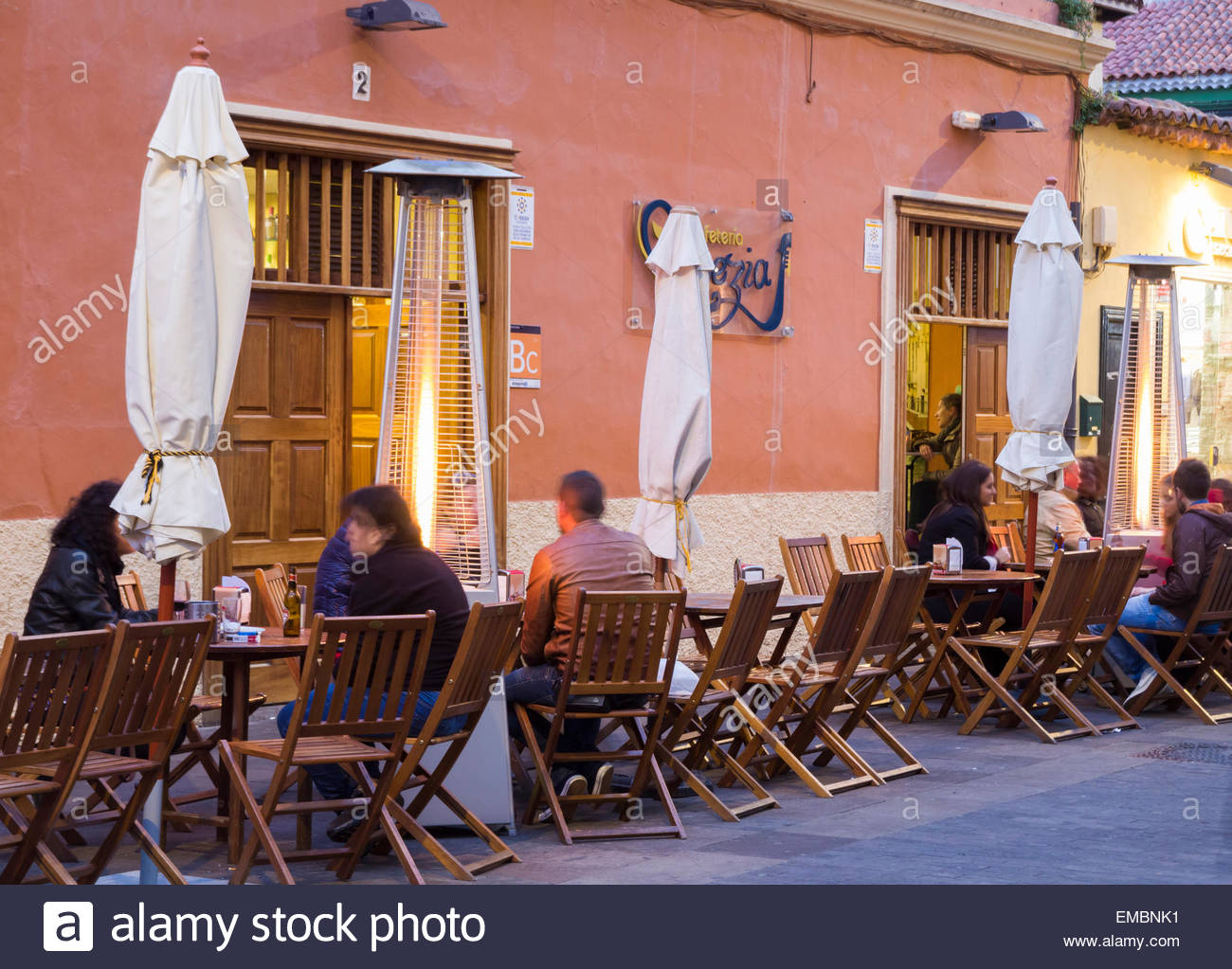 Patio Heaters Outside Street Bar At Night In San Cristobal with regard to proportions 1300 X 1023