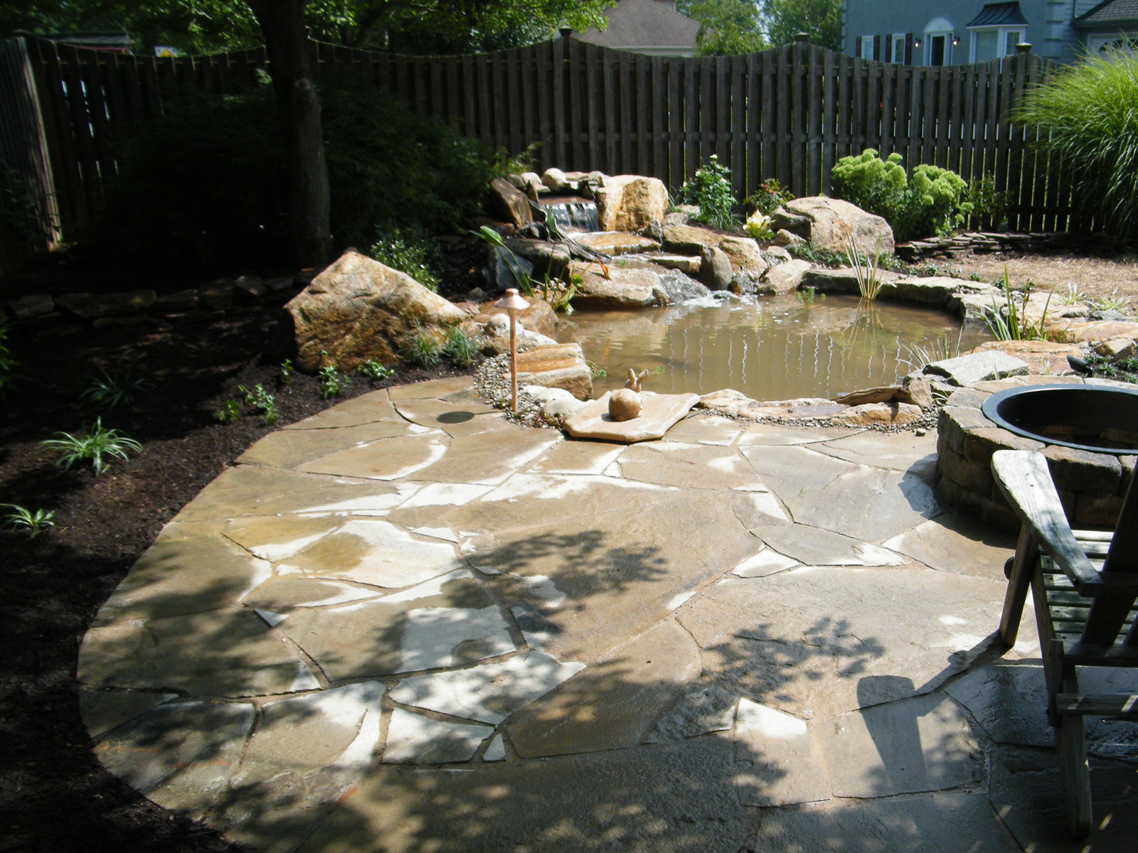 Pond With Irregular Flagstone Patio And Fire Pit Pezzotti within dimensions 1600 X 1200