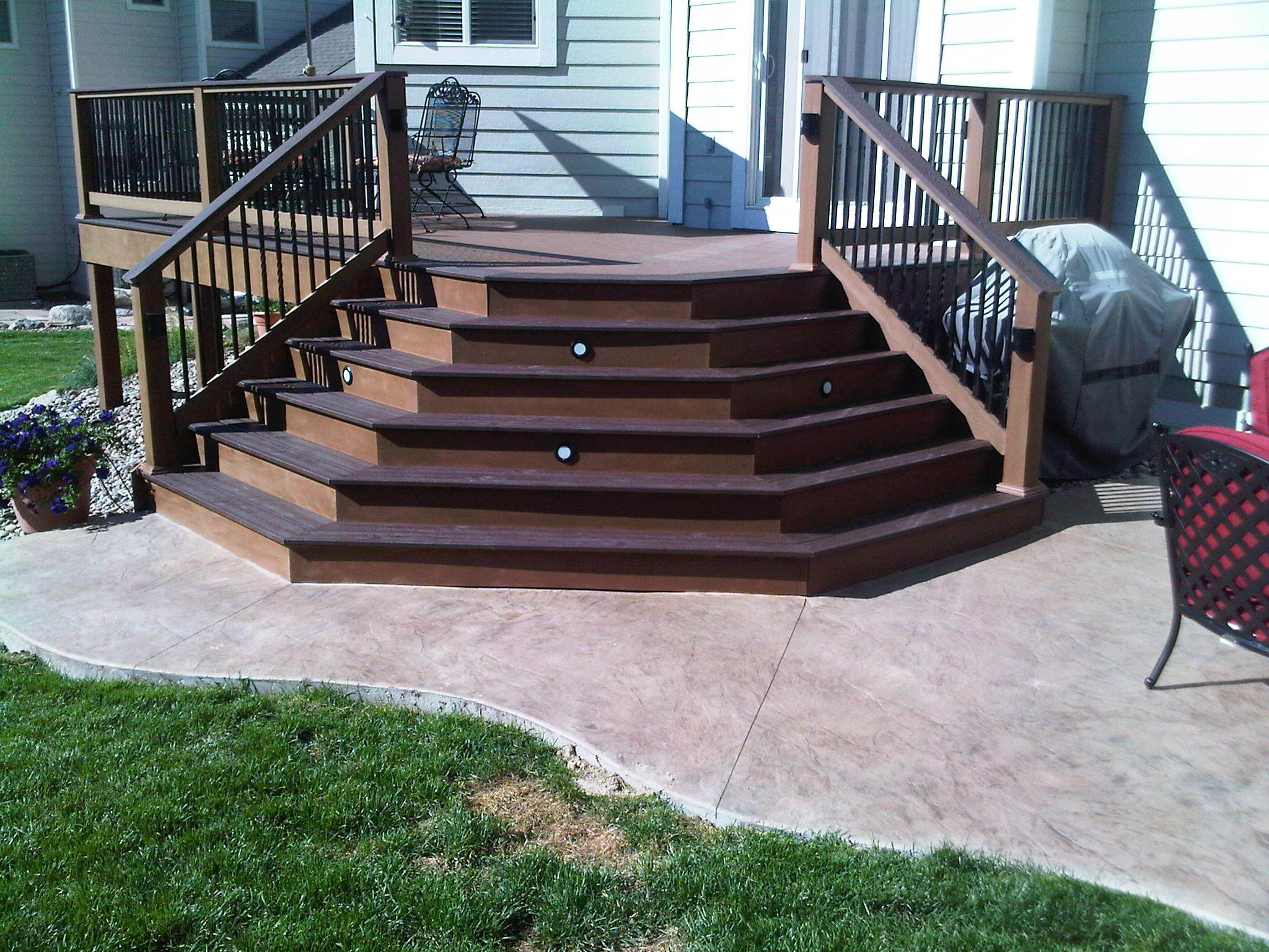 Splayed Trex Composite Deck Stairs Onto Stamped Concrete within measurements 2048 X 1536