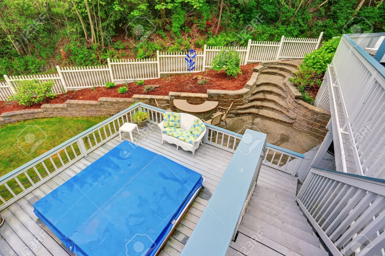 Two Level Backyard Deck With Jacuzzi On The First Floor And Patio within size 1300 X 866