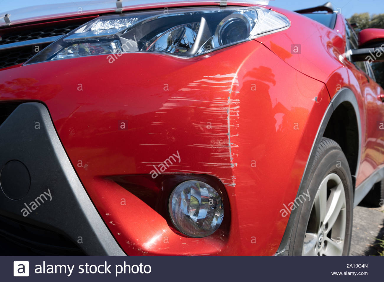 Front Red Car Bumper With Scratches Closeup Accident within size 1300 X 956