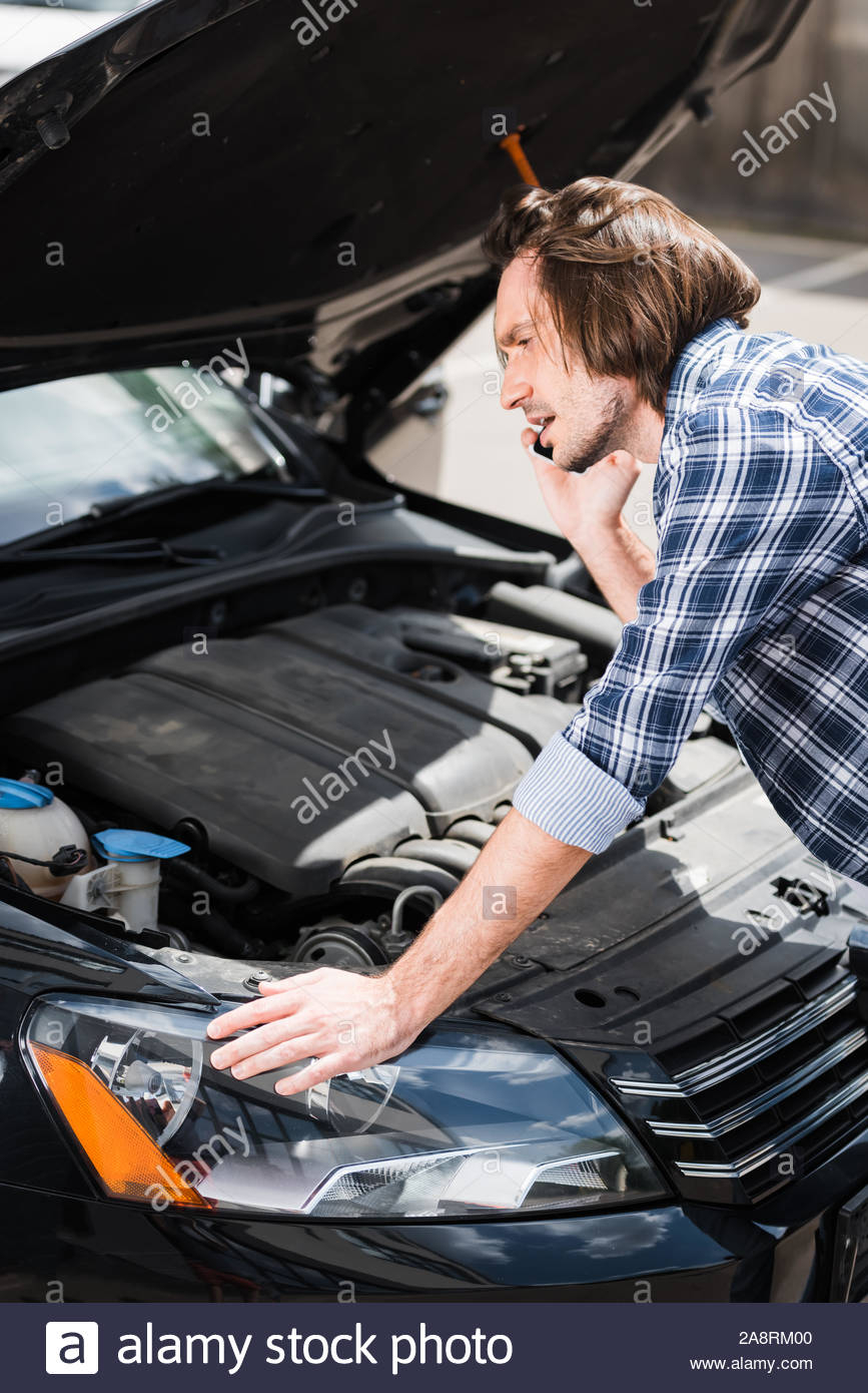 Frustrated Man Talking On Smartphone While Standing Near within size 867 X 1390