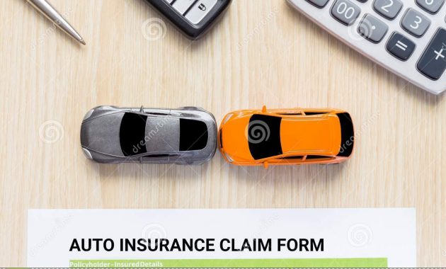 Top View Of Auto Insurance Claim Form With Car Toy Crash On for dimensions 1300 X 957