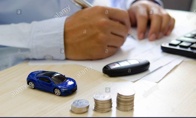 Toy Car Finance Calculator Car Keys And Papers On The Desk throughout size 1300 X 951